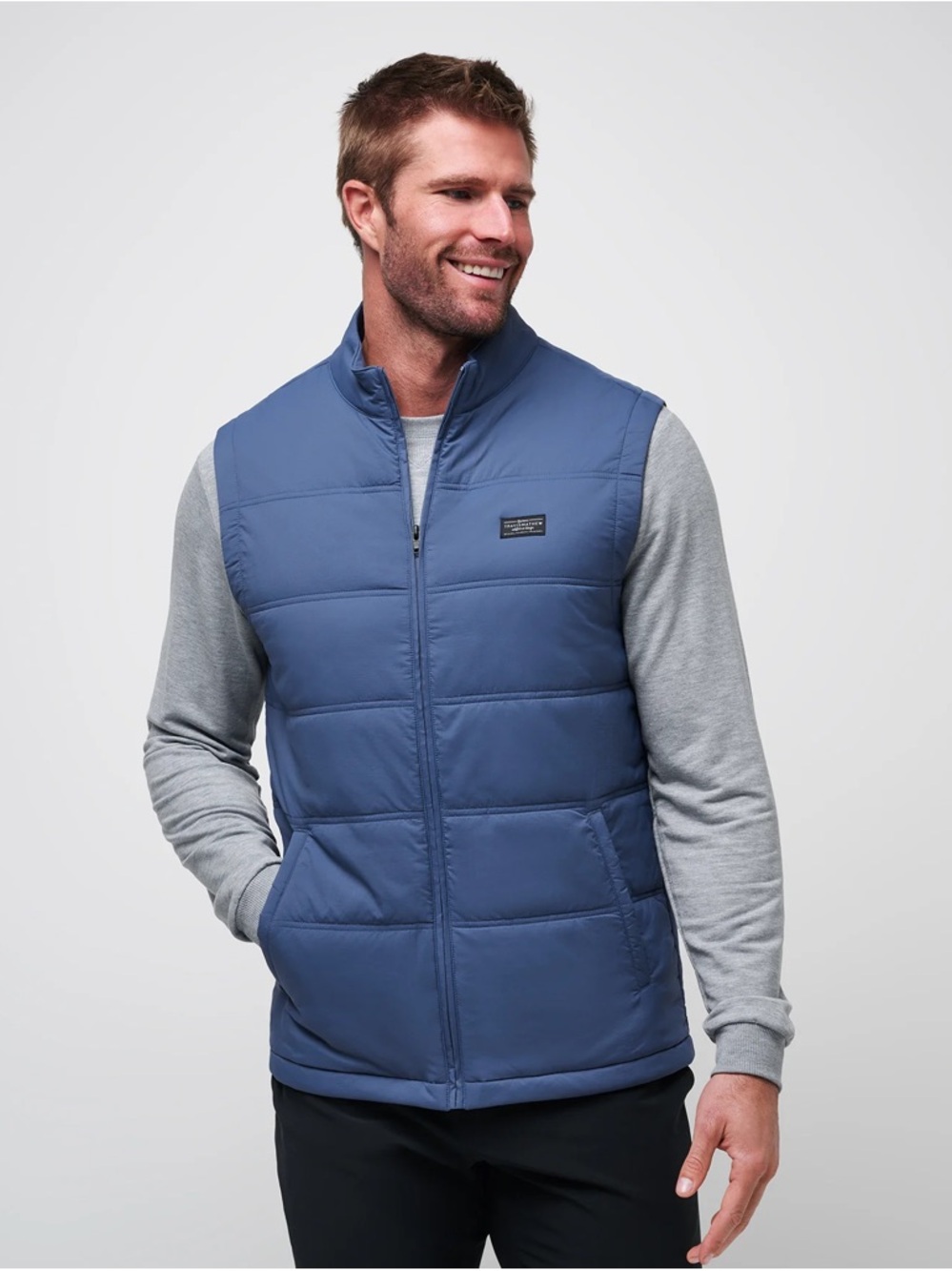 Travis Mathew palisades puffer vest in navy